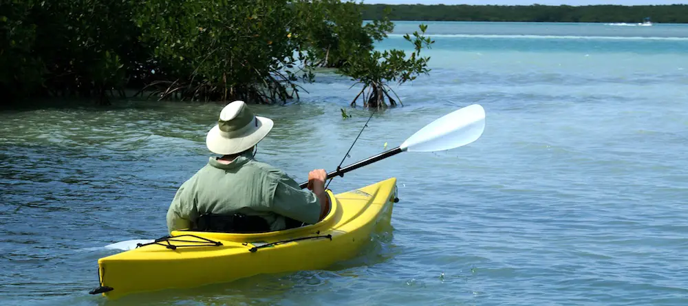 Catching redfish while fishing from kayak in Bradenton, Florida.