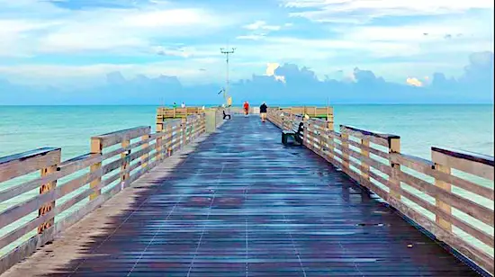 Venice Fishing Pier after a rain. Few anglers fishing on weekdays.