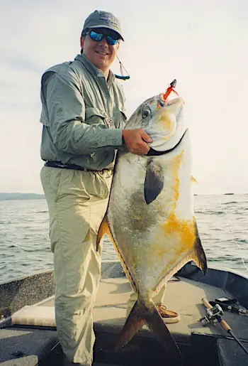World record permit fish of 60 lbs. caught by Brazilian angler Renato Fiedler on a baitcasting reel and medium action rod in December 2002.